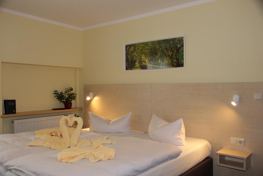 הרינגסדורף Pension Erdmann - Hotel Garni חדר תמונה